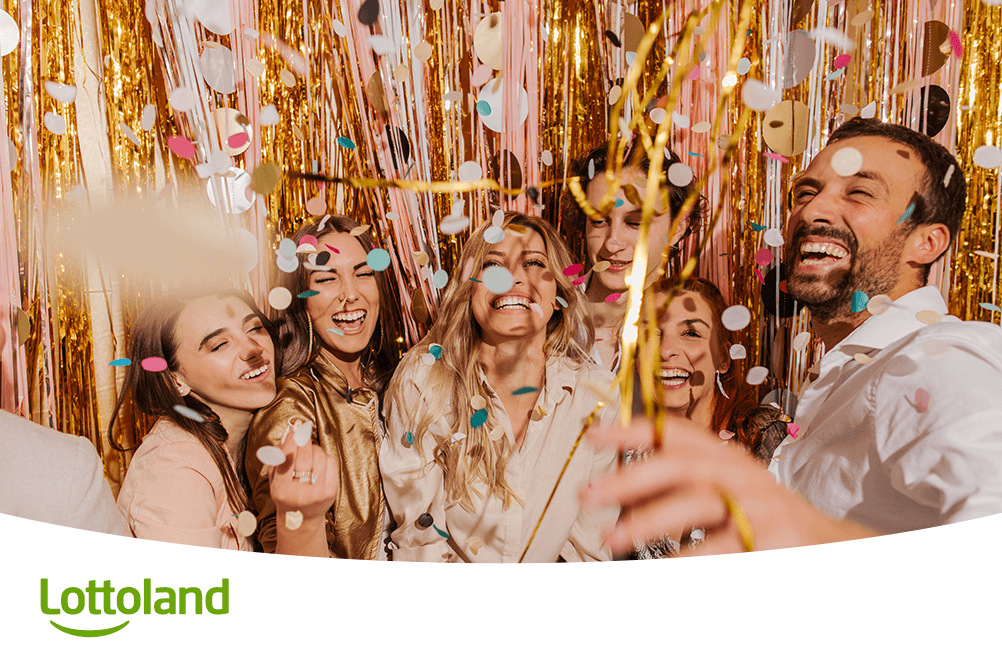 Gruppe feiert ausgelassen mit Konfetti – Symbolbild für das rechtzeitige Abgeben des Lotto-Tipps bei Lottoland vor Annahmeschluss